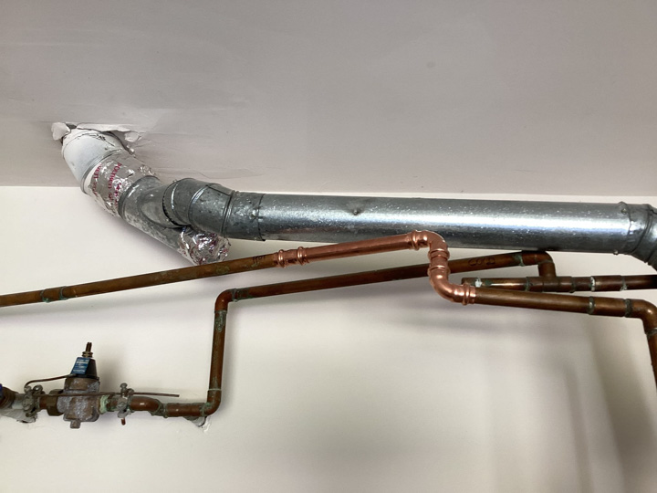 Johns Creek Plumbing Success Story: After picture of repaired copper pipe, resolving the water leakage issue.