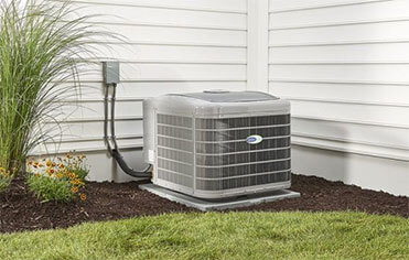 Outside AC Unit, needs attention for regular HVAC maintenance.