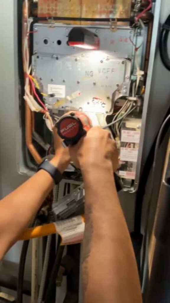A tankless flush in action - this tankless water heater flush cost $350