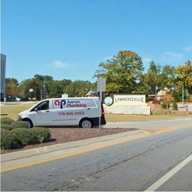 Aaron Plumbing truck on the road in Lawrenceville: Plumber Lawrenceville GA Trusts