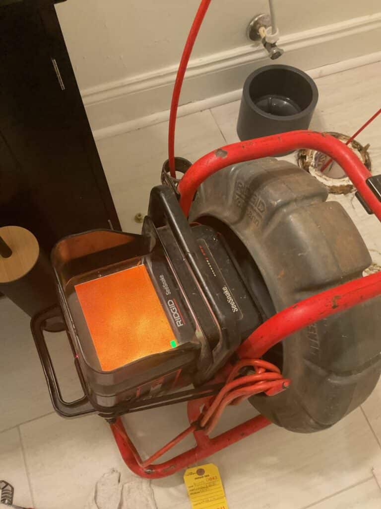 a sewer camera determines whether a customer is experiencing signs of a collapsed sewer line