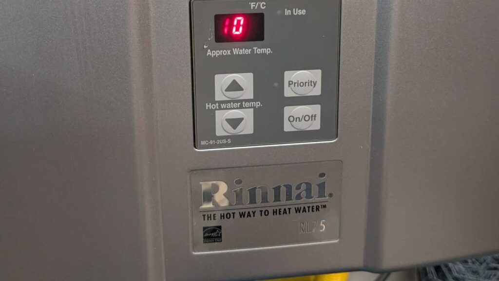 Rinnai Tankless Water Heater showing one of the possible tankless water heater error codes on the pannel