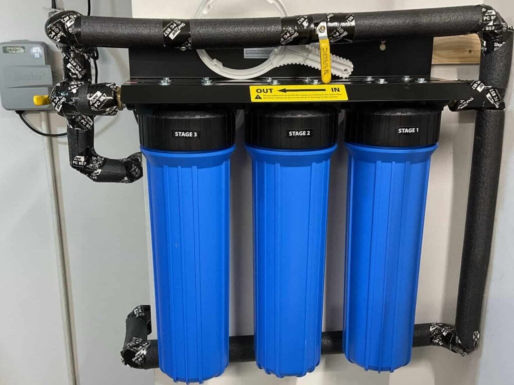 a picture perfect whole house water filtration installation completed by Aaron Plumbing in Cumming, GA, just outside of Atlanta