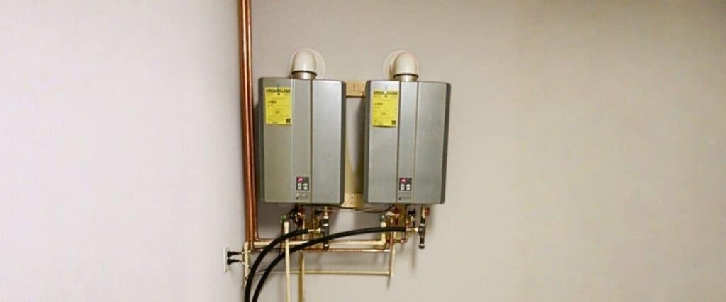 two tankless heaters protected by their Rinnai tankless water heater warranty