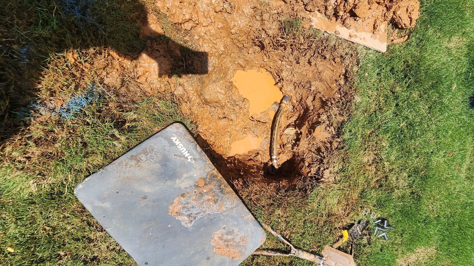 A main water supply in need of a water line repair in Lawrenceville, GA