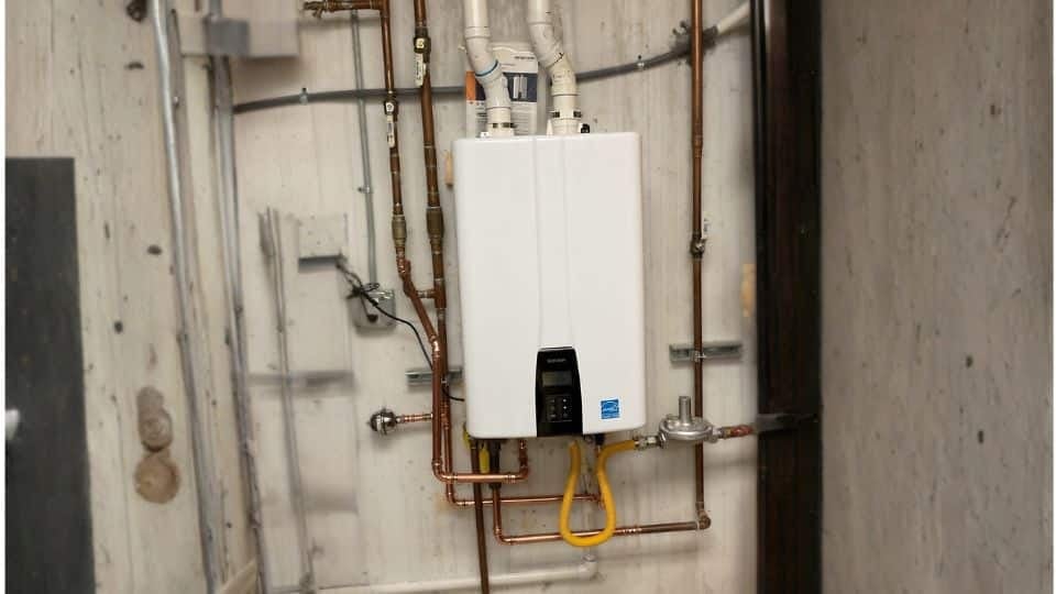 Navien tankless with plumbing connections in need of tankless water heater repair