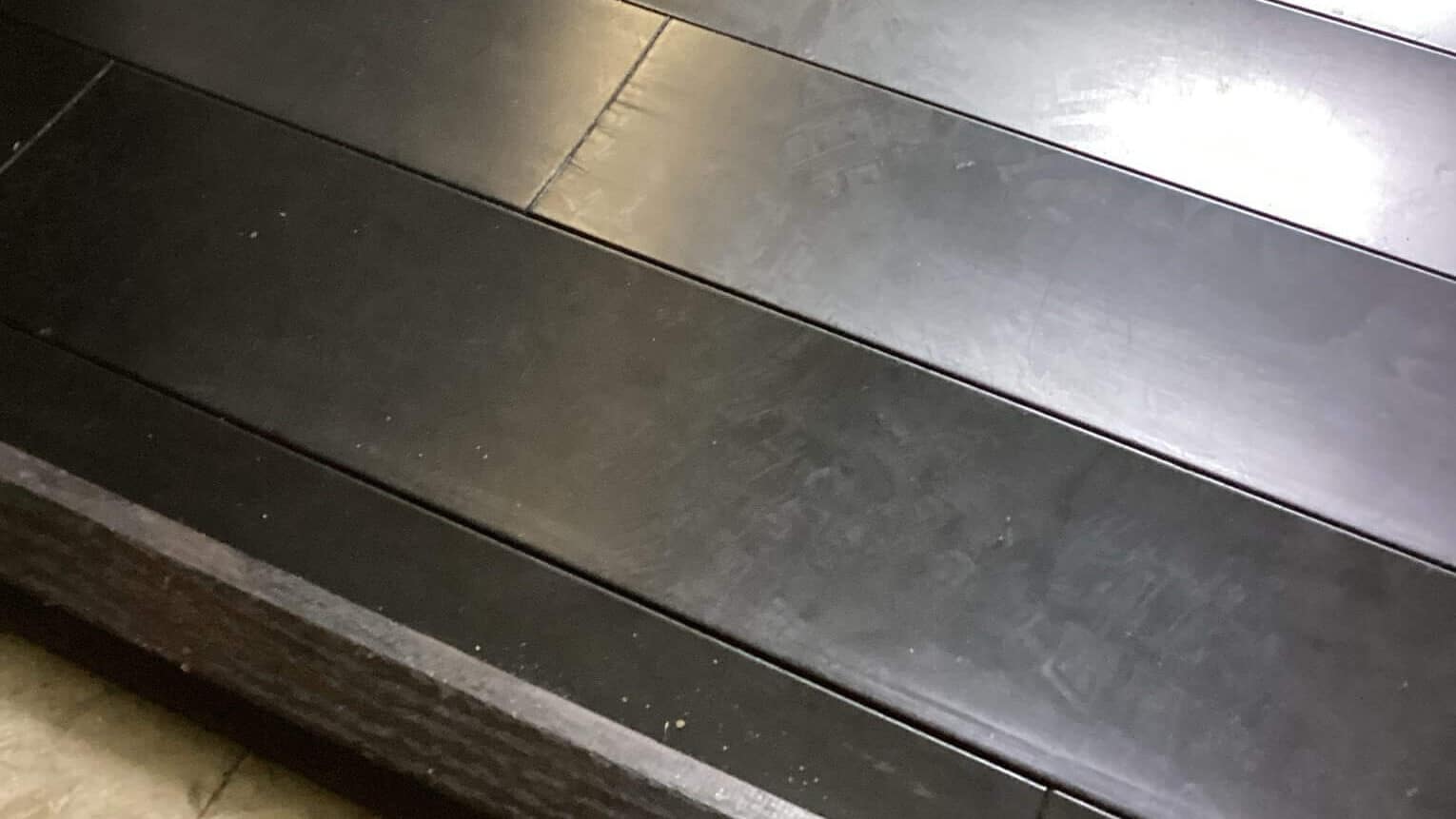 Buckling floors from a leak in a wall