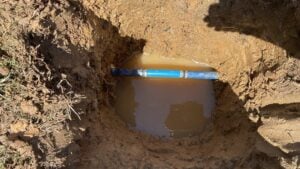 a water line leak revealed by a water meter spinning very slowly