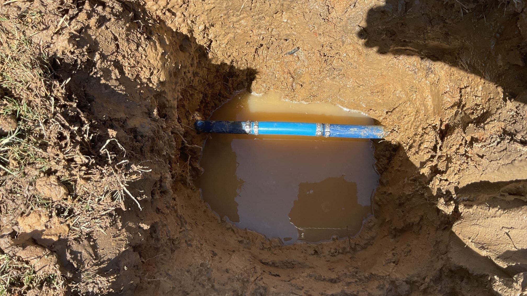 a water line leak revealed by a water meter spinning very slowly